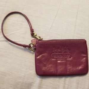 Plum Coach wristlet